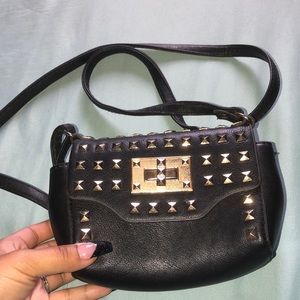 Turn buckle style mini cross body